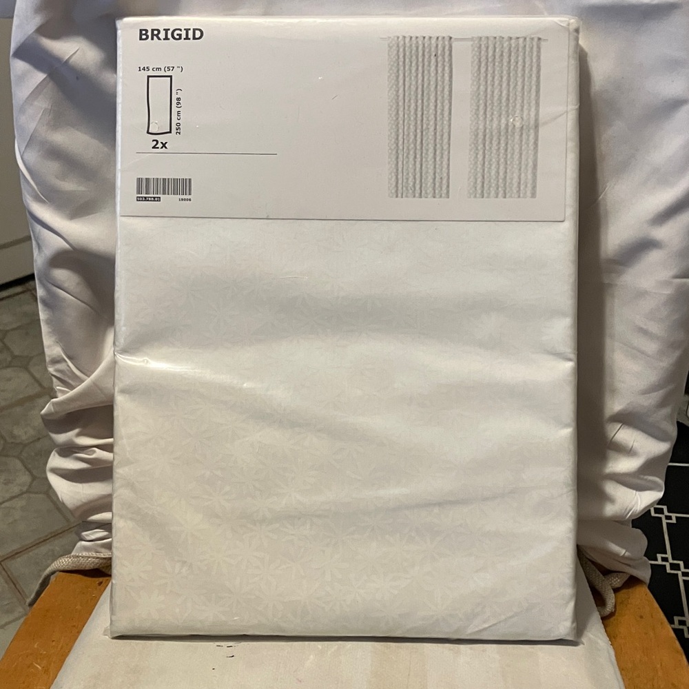 New , still in packaging. IKEA  set of 2 white drapes with starlike designs